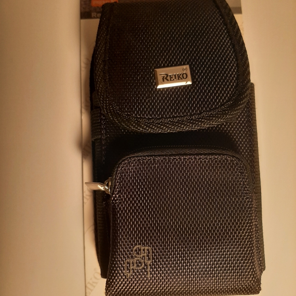 Cell phone belt clip/carrier
